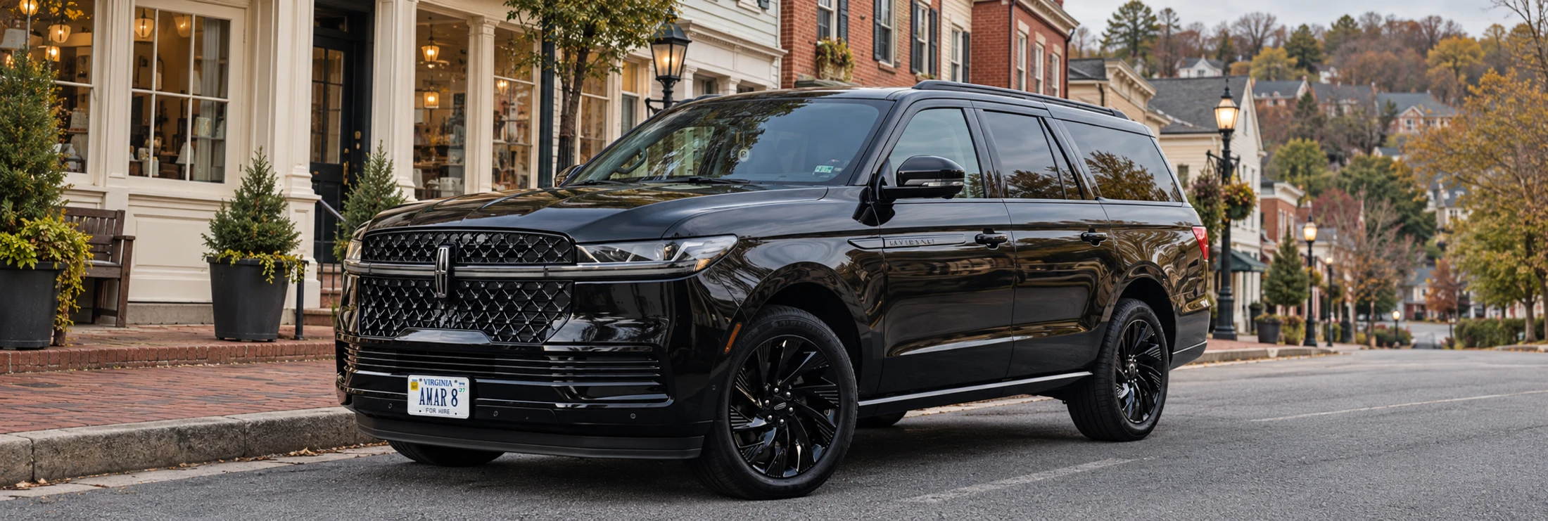 Client-reference black Lincoln Navigator L in a recreated Sykesville Main Street setting