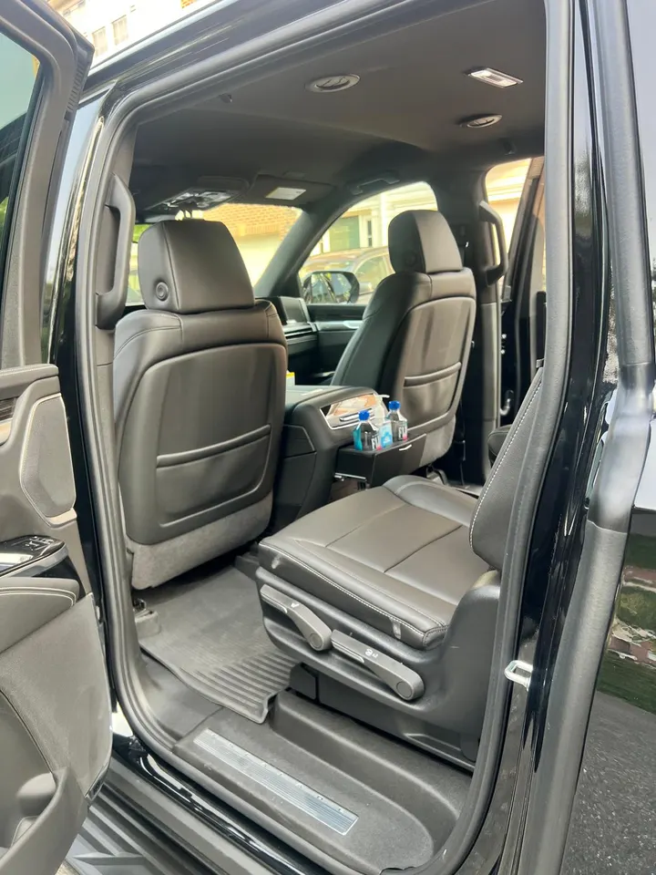 Original Cadillac Escalade second-row seating, legroom and water bottles