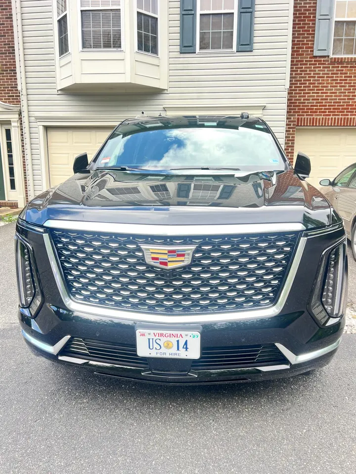 Original Cadillac Escalade front grille and US 14 plate