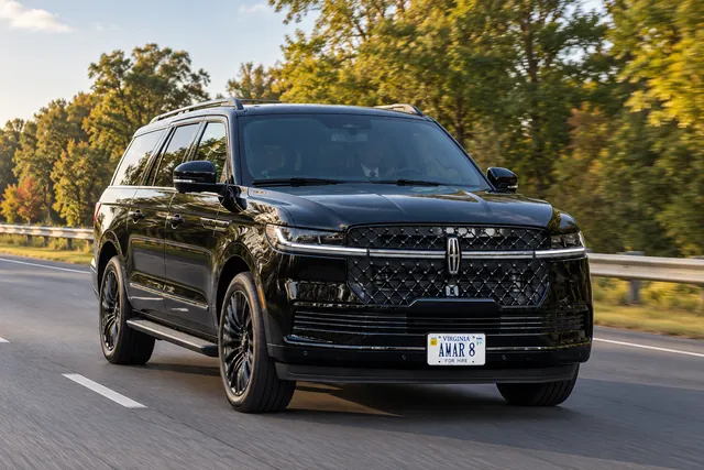 Client-reference Lincoln Navigator AMAR 8 along a quiet Virginia parkway