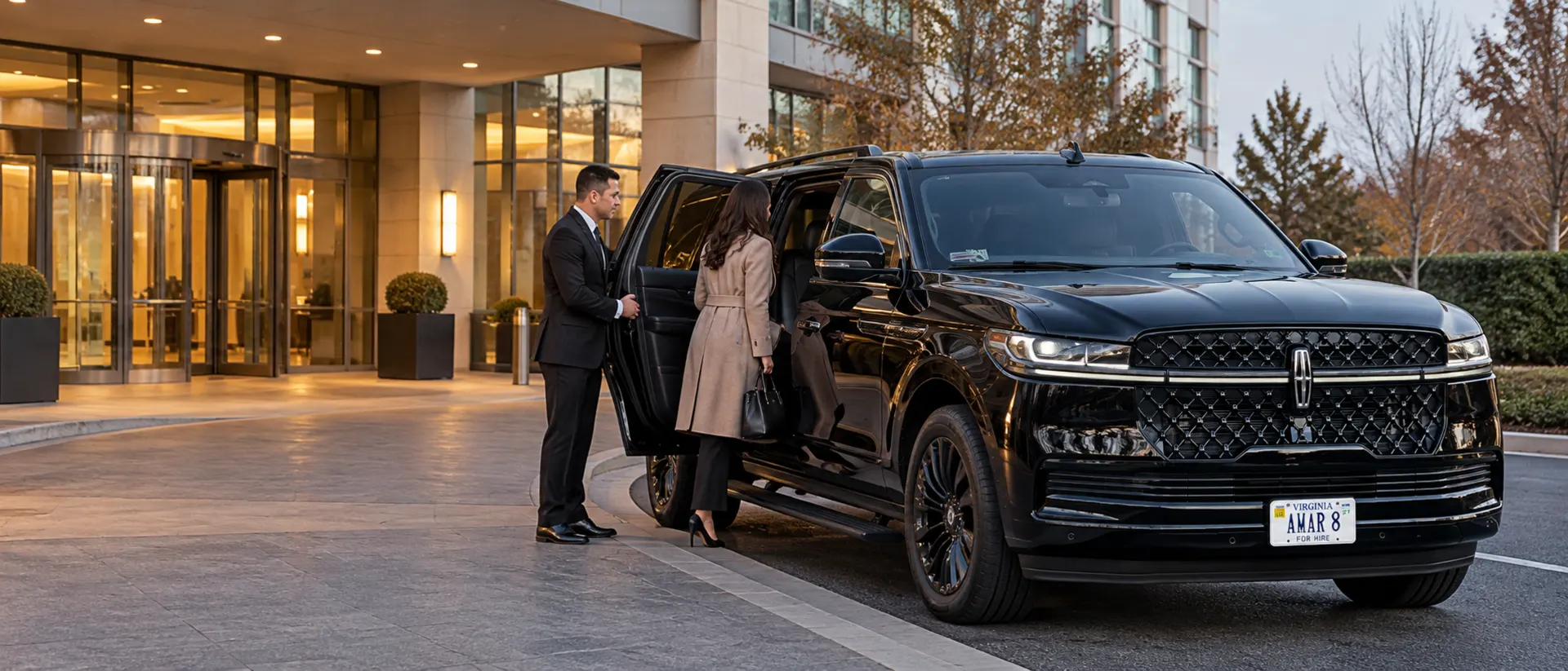 Client-style AMAR 8 Lincoln Navigator L and chauffeur assisting a private traveler outside an Arlington hotel