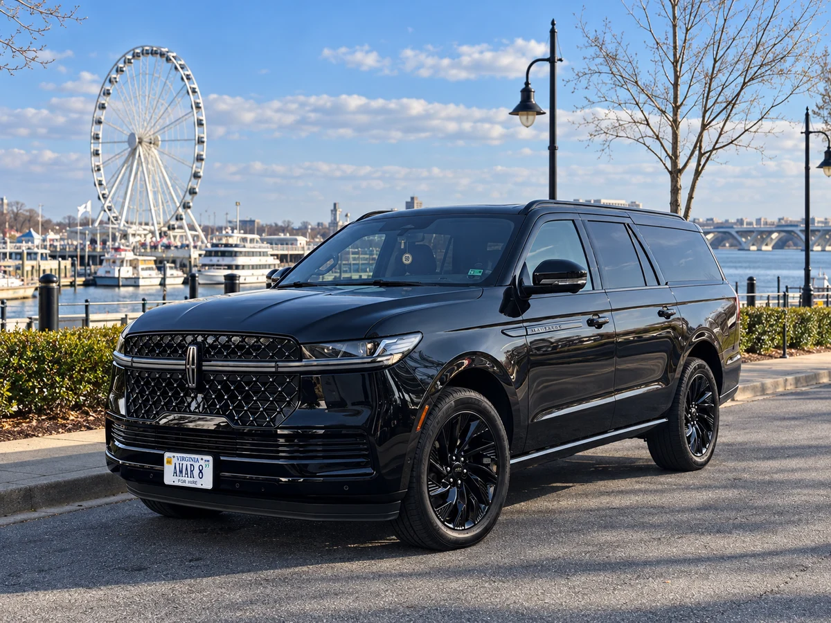 Client-reference Lincoln Navigator L near the Capital Wheel at National Harbor